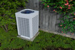 © Pavel Vorobev - outdoor unit of an air conditioner against a light wood wall