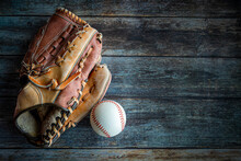 Leather Baseball Or Softball Glove With Ball And Copy Space