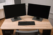 © New Africa - Modern interior. Workplace with multi-monitor on wooden desk in office, space for text