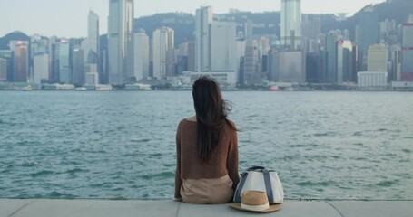 Poster - Woman look at the Hong Kong city