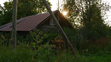 Wall Mural - Beautiful rustic summer landscape. Old wooden log houses. Vologda region