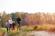 © pikselstock - Young family having fun outdoors