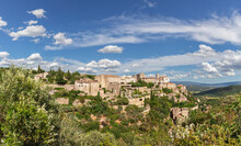 Panoramic View Of Gordes Forest Rock And Old Village On Luberon Massif In French Prealps. Vaucluse, Provence, Alpes, Cote D'Azur, France