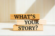 © Uuganbayar - What's your story text concept written on wooden blocks lying on a table