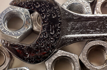 Wall Mural - close-up water drops on  wrench and nuts