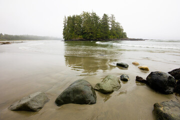 Wall Mural - Small island on Long Beach in Tofino, Vancouver Island, Canada