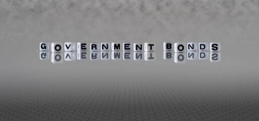 Wall Mural - government bonds word or concept represented by black and white letter cubes on a grey horizon background stretching to infinity