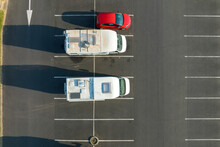 Aerial View Of Camper Vans Parked On Parking Lot