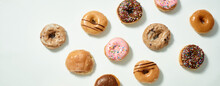 Colorful Assorted Glazed Donuts Flay Lay