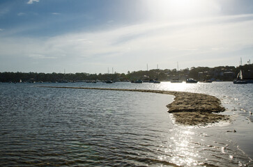 Low tide sea beach show up sand in the middle of the bay at Port Hacking, Cronulla,Sydney,Australia.