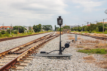 Poster - A railway switch or track construction in close proximity to a railway station