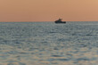 Scenic view of a boat sailing in the blue seascape near Marco Islands at sunset