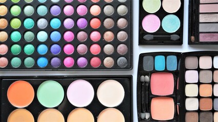 Sticker - Collection of various cosmetic products. Make up eyeshadow palettes. 