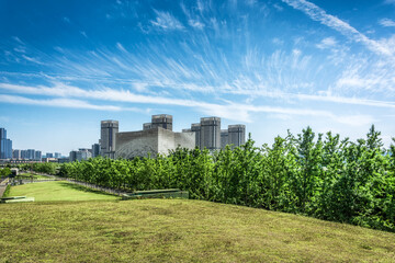 Poster - Buildings and green parks in a modern big city