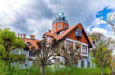 Wall Mural - Old mansion in the garden in spring