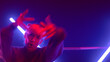 © stockbusters - Energetic girl dancing freestyle in led lights closeup. Woman dancer moving body