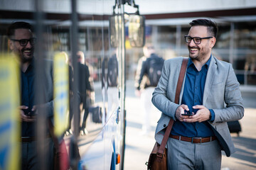 Wall Mural - Business man on bus station