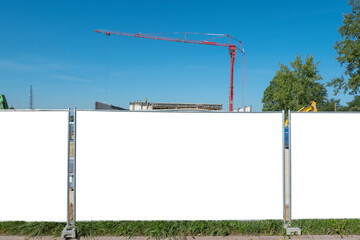 Poster - Advertising banner mock-up on the fence of construction site