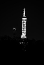 Petrin Lookout Tower In Prague, Czech Republic.  Petrin Hill Park,  Resembling Eiffel Tower. At Night.
