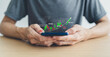 © Koto Amatsukami - Man using smartphone with graph or mobile phone with chart. Business and finance planning concept of growth and success. Investor working with data analysis and strategy of stock market fund