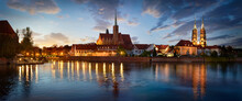 Panoramic Evening View On Wroclaw Old Town. Island "Ostrow Tumski’’.and Cathedral Of St John With Bridge Through River Odra. Wroclaw, Poland.