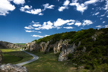 Wall Mural - Dobrogea gorges landscape blue sky with clouds Geological Reservation Dobrogea Romania