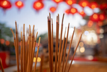 Burning incense sticks at the big Chinese temple