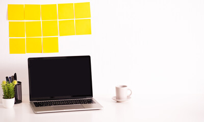 Wall Mural - yellow post note paper, memo paper on a screen laptop computer. scheduled for job or short note for 
