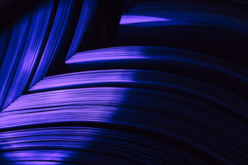 Fototapete - Close up Beautiful book pages in the blue light on a night. Background pattern for design. Macro photography view.