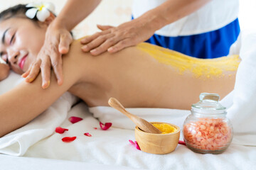 Wall Mural - Spa Woman. Brunette Getting a Salt Scrub Beauty Treatment in the Health Spa. Body Scrub.