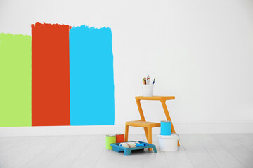 Wall Mural - Set with decorator tools and paint on floor near wall