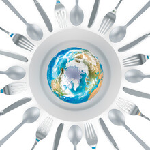 Earth Globe On The Plate With Knives, Spoons And Forks Around, 3D Rendering