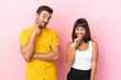 © luismolinero - Young couple isolated on pink background smiling with a sweet expression