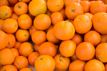 Oranges on sale at the local market. Oranges background