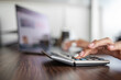 © abramov_jora - close-up of a woman's hand on a calculator counting