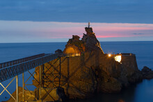 Biarritz, France, Rock Of The Virgin -Rocher De La Vierge In French On Dramatical Sunset Over Atlantic Ocean