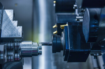 Wall Mural - cnc lathe machine cutting the metal screw thread part, the hi-technology parts manufacturing
