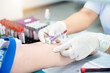 © Chutipon - Close up hand of nurse, taking blood sample from a patient in the hospital.