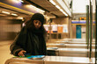 © Johnér - Woman paying for subway ticket with smart phone
