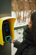 © Johnér - Woman paying for ticket with credit card
