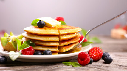 Wall Mural - pile of pancakes and berries fruits