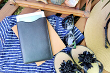 Mock Up With Electronic Book, Notebook Diary And Flip Flops, Outdoor