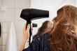 © Johnér - Woman drying hair