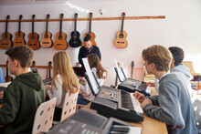 Teenagers Attending Keyboard Lesson