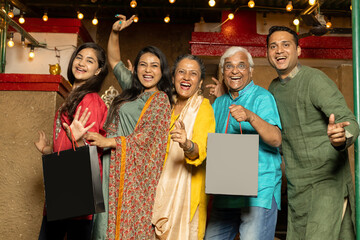 Indian people in Ethnic wear celebrating shopping on festival 