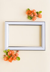 Sticker - beautiful flower arrangement. Bright orange flowers, empty photo frame for text on a light pastel background. Wedding. birthday. Valentine's Day. mothers Day. top view, copy space