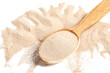 Active dry baking yeast granules in wooden spoon