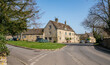 The Village Green and the Swan public house in Southrop, the Cotswolds, England, United Kingdom