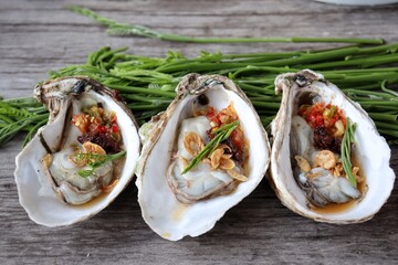 Sticker - Fresh oyster and shell seafood on wood background