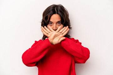 Young hispanic woman isolated on white background doing a denial gesture